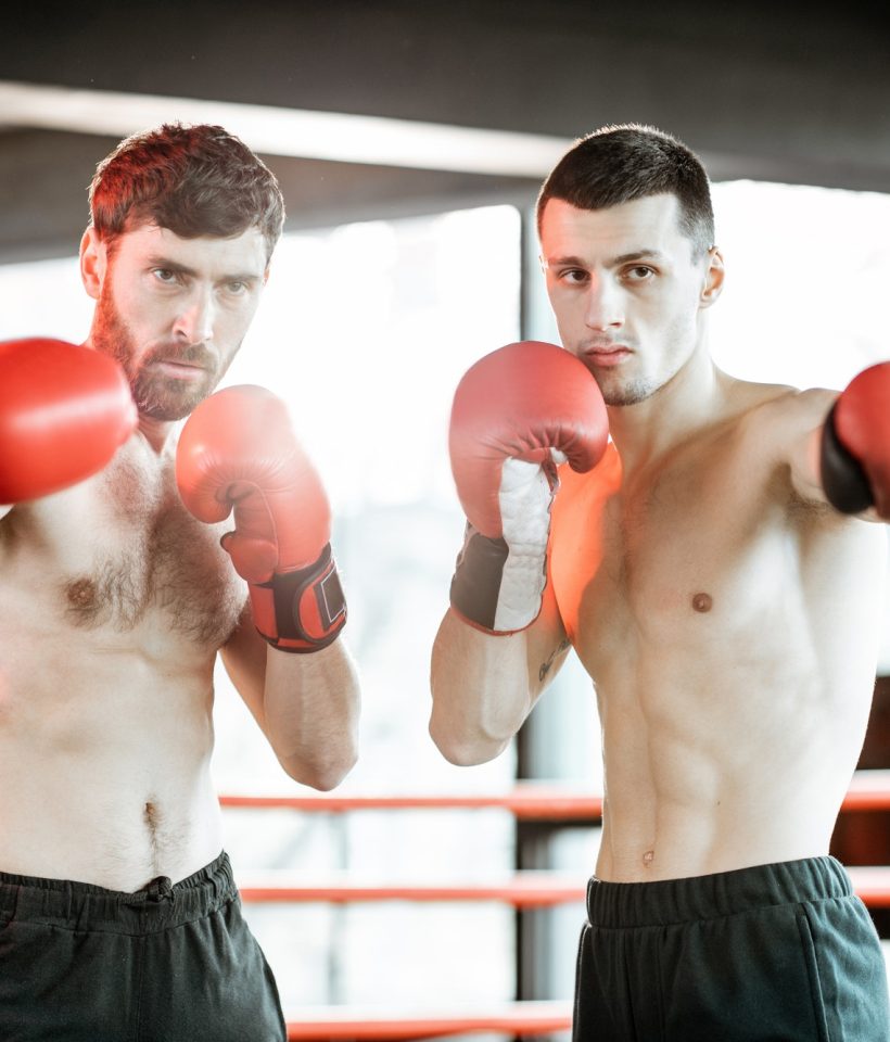 two-professional-boxers-training-at-the-gym.jpg